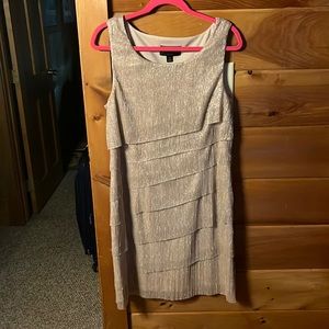 Gold shimmer dress with pleated bottom!